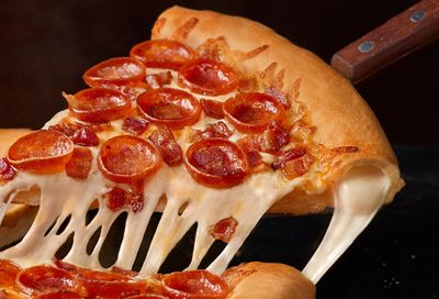 Select Round Table Pizza Locations Offer a Free Stuffed Crust Upgrade with a Large Pizza Purchase (In-app Only) on February 9
