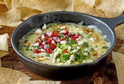 My Chili's Rewards Members will Receive a Free Chips & Queso or Guac Reward with Entree Purchase this Weekend